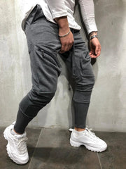 Pantalones deportivos casuales nuevos para hombre con cremallera en color liso.