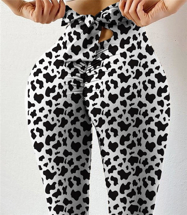 Pantalon de yoga sexy taille haute très extensible avec imprimé nœud sur les hanches