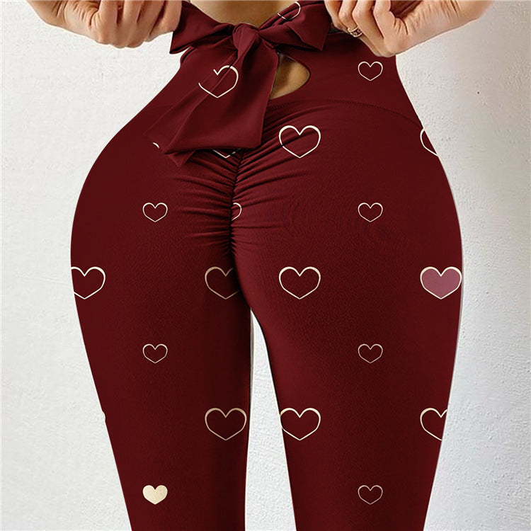 Pantalon de yoga sexy taille haute très extensible avec imprimé nœud sur les hanches