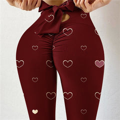 Pantalon de yoga sexy taille haute très extensible avec imprimé nœud sur les hanches