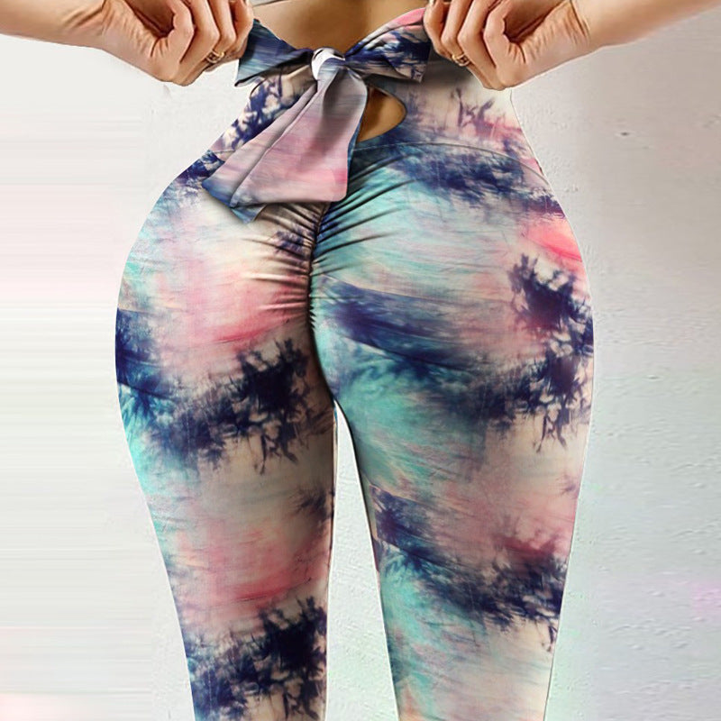 Pantalon de yoga sexy taille haute très extensible avec imprimé nœud sur les hanches