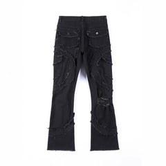 Vaqueros elásticos con flecos y patchwork para hombre, ligeramente acampanados