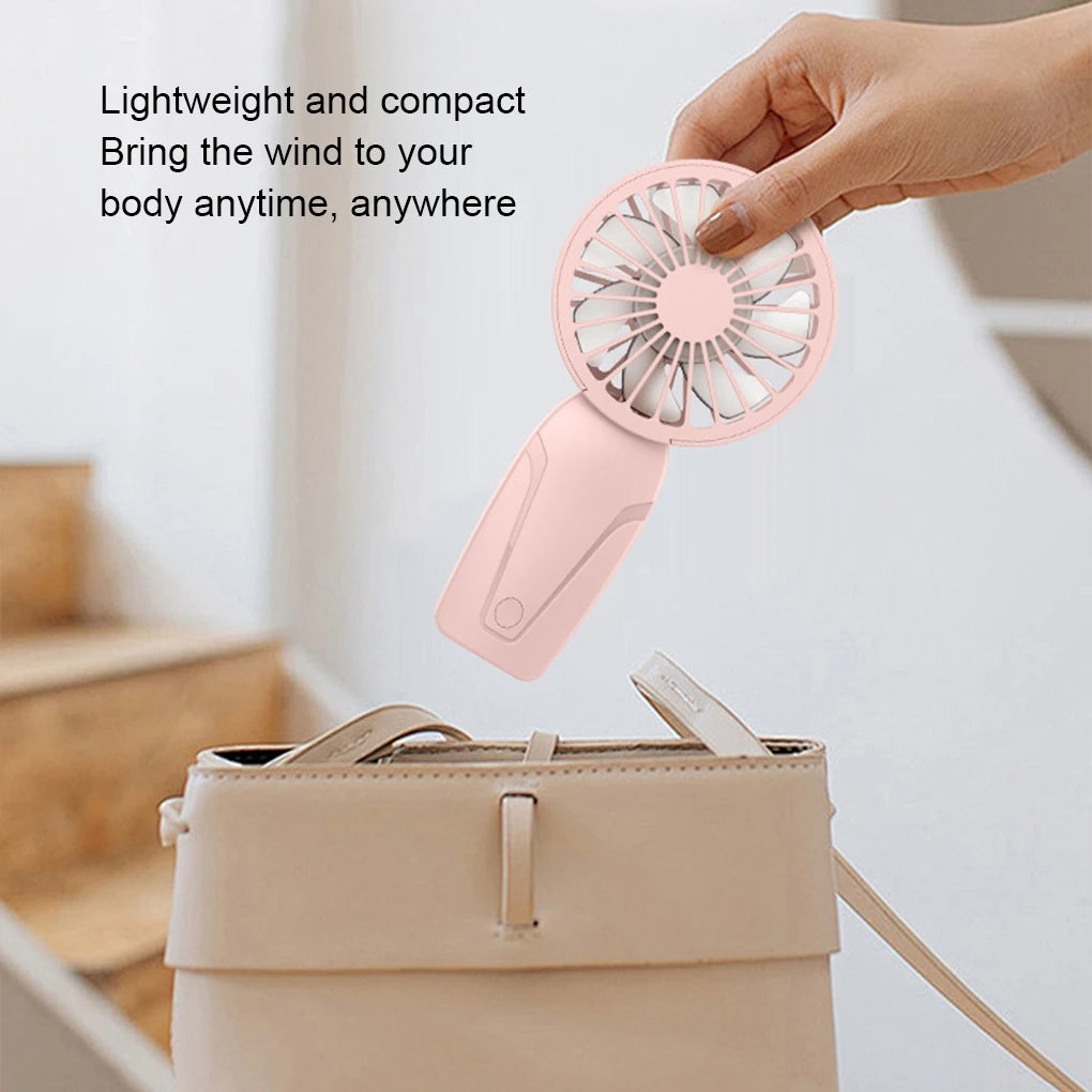Ventilador portátil pequeño de mano ABS ligero y de aspecto bonito, mini ventilador recargable por USB para enfriar en cualquier lugar. Mini ventilador portátil de bolsillo.