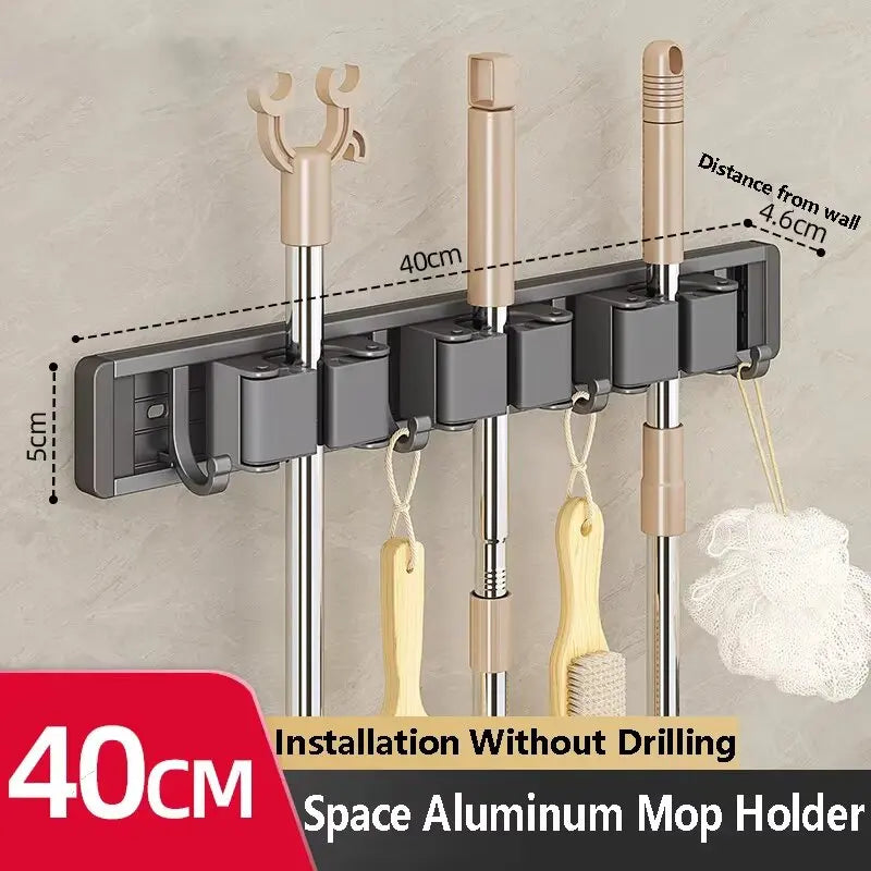 Organizador de trapeador y escoba de pared con 5 ganchos, resistente soporte autoadhesivo para trapeador, ideal para cocina, baño y almacenamiento de herramientas de limpieza.