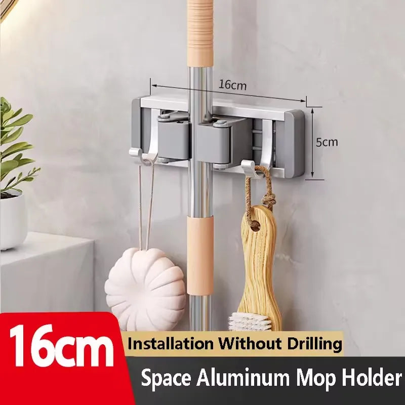 Organizador de trapeador y escoba de pared con 5 ganchos, resistente soporte autoadhesivo para trapeador, ideal para cocina, baño y almacenamiento de herramientas de limpieza.