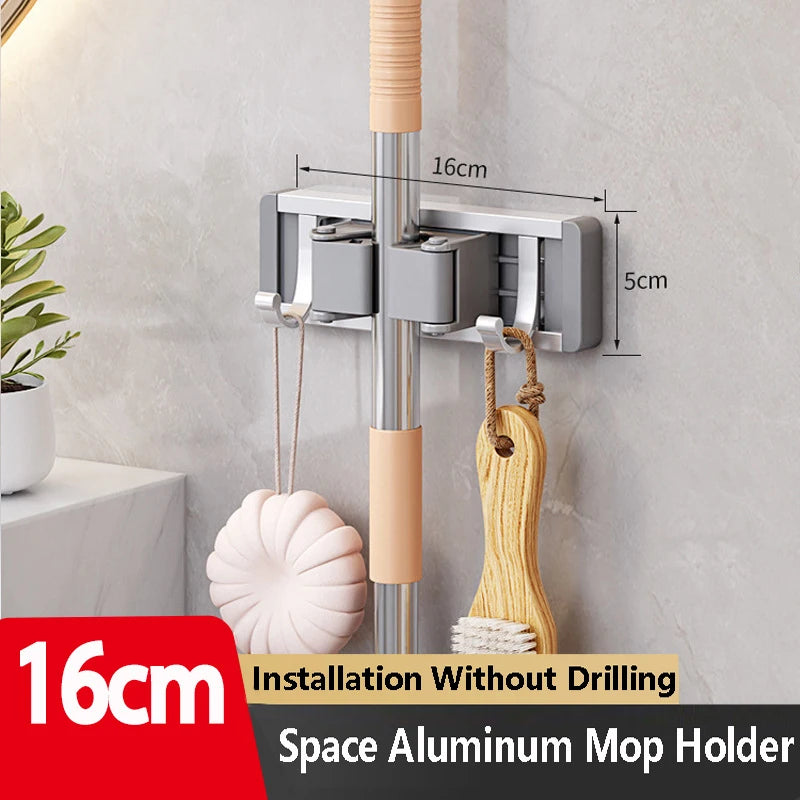 Organizador de trapeador y escoba de pared con 5 ganchos, resistente soporte autoadhesivo para trapeador, ideal para cocina, baño y almacenamiento de herramientas de limpieza.