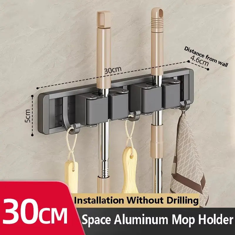 Organizador de trapeador y escoba de pared con 5 ganchos, resistente soporte autoadhesivo para trapeador, ideal para cocina, baño y almacenamiento de herramientas de limpieza.