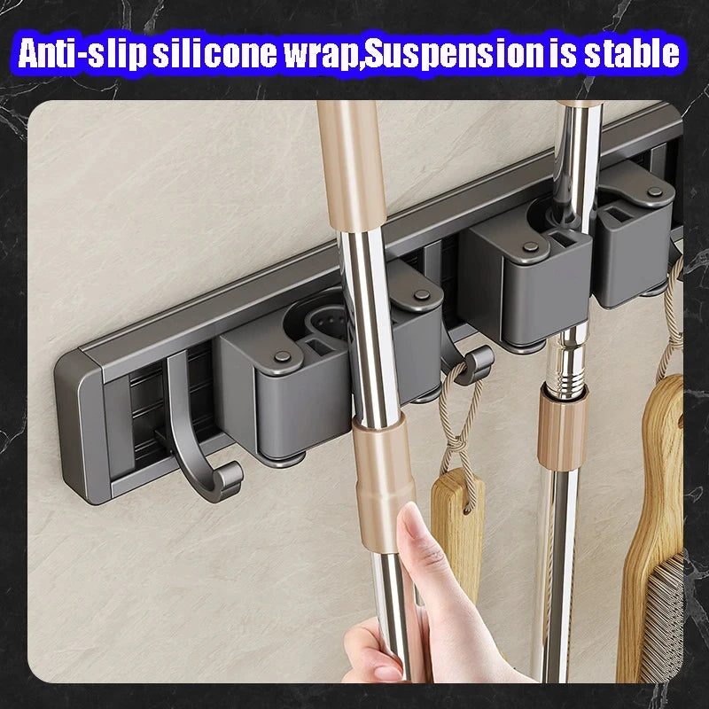 Organizador de trapeador y escoba de pared con 5 ganchos, resistente soporte autoadhesivo para trapeador, ideal para cocina, baño y almacenamiento de herramientas de limpieza.