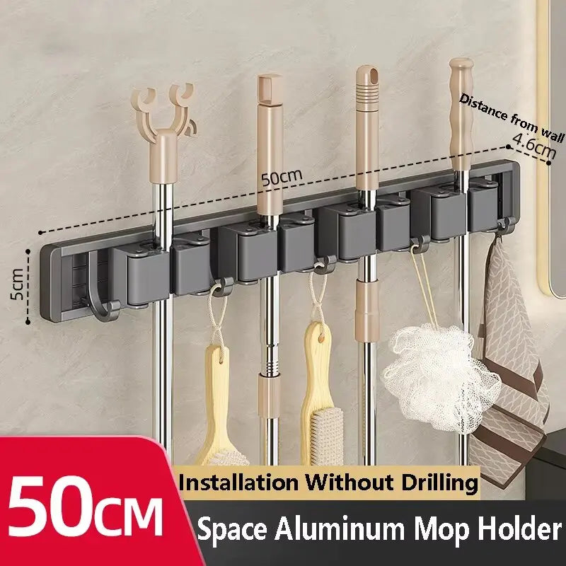 Organizador de trapeador y escoba de pared con 5 ganchos, resistente soporte autoadhesivo para trapeador, ideal para cocina, baño y almacenamiento de herramientas de limpieza.