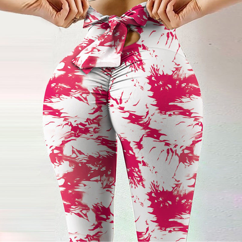 Pantalon de yoga sexy taille haute très extensible avec imprimé nœud sur les hanches